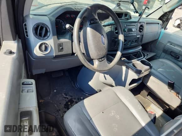 2014 Ford Econoline Cargo Commercial с VIN 1FTNE1EW4EDA35683, выставлен на аукционе Copart как лот 63410135 с пробегом Не указан миль и Списание • Salvage title. История ставок и продаж доступна на DreamBid. Изображение 8.