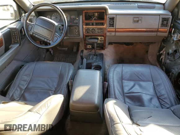 1994 Jeep Grand Cherokee Limited z VIN 1J4GZ78S0RC357283, wystawiony jako Copart lot #49236995 z przebiegiem 84 306 mil mil oraz Szkoda całkowita • Salvage title. Historia ofert i sprzedaży dostępna na DreamBid. Obrazek 8.