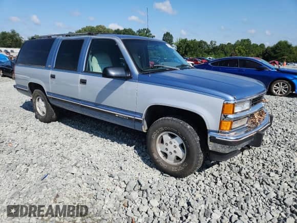 1994 Chevrolet Suburban with VIN 1GNFK16K3RJ437833, listed as a Copart auction lot 68364245 with 178,813 mi miles and Salvage title. Bid and sale history available at DreamBid. Image 4.