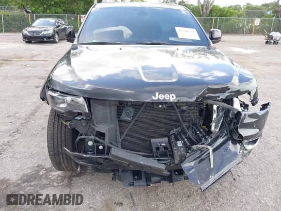 2018 Jeep Grand Cherokee Altitude with VIN 1C4RJFAG6JC504653, listed as a IAAI auction lot 42706233 with 62,059 mi miles and . Bid and sale history available at DreamBid. Image 6.