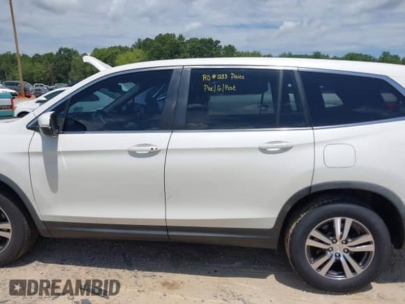 2016 Honda Pilot EX-L with VIN 5FNYF6H64GB038436, listed as a IAAI auction lot 42735200 with 165,507 mi miles and . Bid and sale history available at DreamBid. Image 14.
