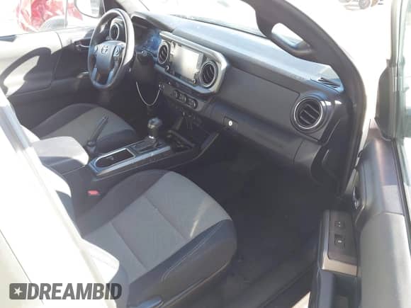 2021 Toyota Tacoma SR5 с VIN 3TMAZ5CN7MM144212, выставлен на аукционе IAAI как лот 41286049 с пробегом 75 113 миль миль и . История ставок и продаж доступна на DreamBid. Изображение 5.