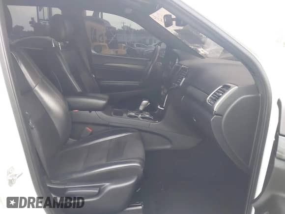 2020 Jeep Grand Cherokee Laredo E with VIN 1C4RJFAG5LC375033, listed as a IAAI auction lot 42415231 with 62,489 mi miles and . Bid and sale history available at DreamBid. Image 5.