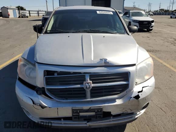 2011 Dodge Caliber Mainstreet with VIN 1B3CB3HA0BD254875, listed as a Copart auction lot 84046695 with 126,631 mi miles and Salvage title. Bid and sale history available at DreamBid. Image 5.