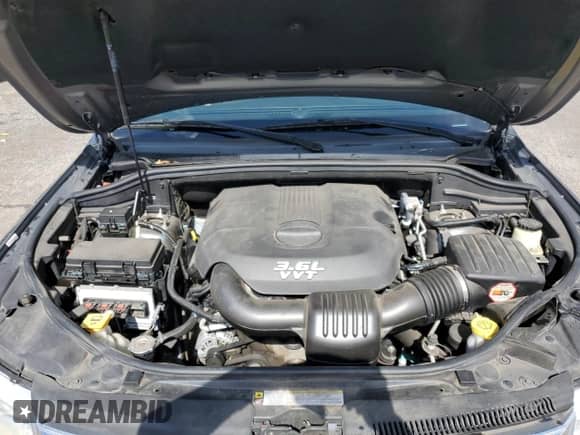 2012 Jeep Grand Cherokee Limited z VIN 1C4RJEBG7CC276299, wystawiony jako Copart lot #64085755 z przebiegiem 86 272 mil mil oraz Szkoda całkowita • Salvage title. Historia ofert i sprzedaży dostępna na DreamBid. Obrazek 12.