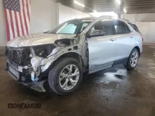 2020 Chevrolet Equinox Premier with VIN 3GNAXNEV2LS527009, listed as a Copart auction lot 64666645 with 33,470 mi miles and Salvage title. Bid and sale history available at DreamBid. Image 1.