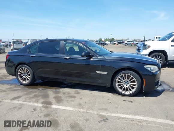 2015 BMW 7 Series 740Li с VIN WBAYE4C50FD138977, выставлен на аукционе IAAI как лот 42277341 с пробегом 109 877 миль миль и . История ставок и продаж доступна на DreamBid. Изображение 13.