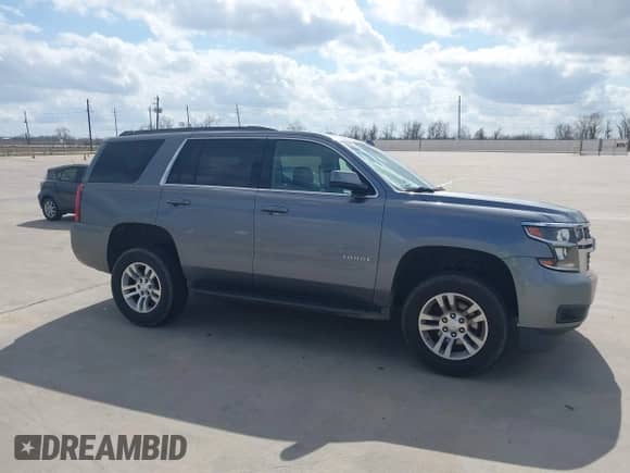 2019 Chevrolet Tahoe LS with VIN 1GNSKAKC7KR347704, listed as a IAAI auction lot 41532849 with 219,466 mi miles and . Bid and sale history available at DreamBid. Image 13.
