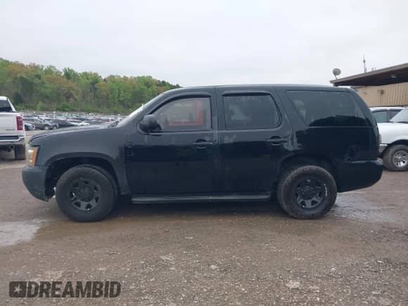 2014 Chevrolet Tahoe Commercial с VIN 1GNLC2E09ER220207, выставлен на аукционе IAAI как лот 41970507 с пробегом Не указан миль и . История ставок и продаж доступна на DreamBid. Изображение 14.