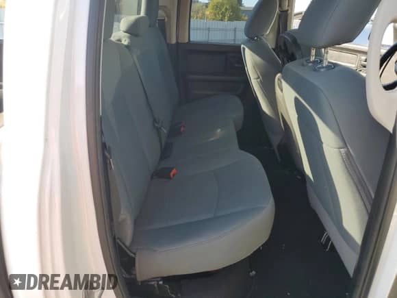 2018 Ram 1500 Tradesman z VIN 1C6RR7FGXJS272482, wystawiony jako Copart lot #80937775 z przebiegiem 85 030 mil mil oraz Szkoda całkowita • Salvage title. Historia ofert i sprzedaży dostępna na DreamBid. Obrazek 10.