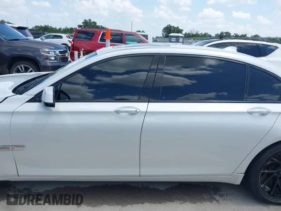 2012 BMW 7 Series 750Li z VIN WBAKB8C54CC964576, wystawiony jako IAAI lot #42499443 z przebiegiem 78 728 mil mil oraz . Historia ofert i sprzedaży dostępna na DreamBid. Obrazek 15.