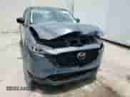 2022 Mazda CX-5 S Carbon Edition z VIN JM3KFBCM3N0576228, wystawiony jako Copart lot #63972945 z przebiegiem 63 644 mil mil oraz Nie do naprawy • Non repairable. Historia ofert i sprzedaży dostępna na DreamBid. Obrazek 14.