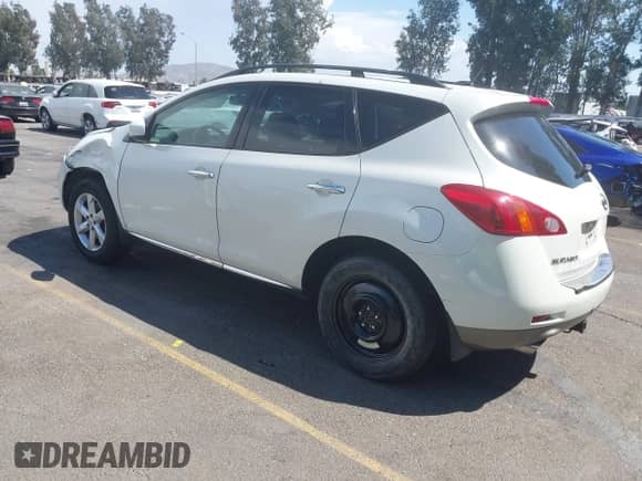 2009 Nissan Murano LE with VIN JN8AZ18W29W114654, listed as a IAAI auction lot 43076588 with 209,520 mi miles and . Bid and sale history available at DreamBid. Image 3.