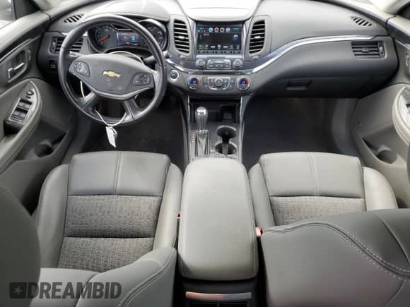 2018 Chevrolet Impala LT с VIN 2G1105S38J9107077, выставлен на аукционе Copart как лот 67289045 с пробегом 55 011 миль миль и Списание • Salvage title. История ставок и продаж доступна на DreamBid. Изображение 8.