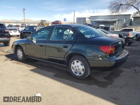2000 Saturn SL with VIN 1G8ZG5286YZ181917, listed as a Copart auction lot 43960675 with 220,481 mi miles and Salvage title. Bid and sale history available at DreamBid. Image 2.