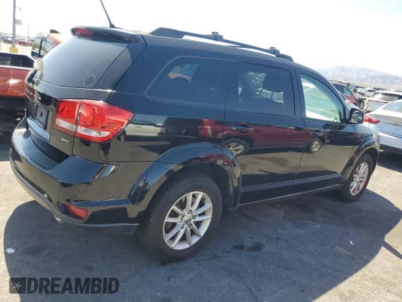 2014 Dodge Journey SXT with VIN 3C4PDDBG7ET297654, listed as a Copart auction lot 62957915 with 203,313 mi miles and Clean title. Bid and sale history available at DreamBid. Image 3.