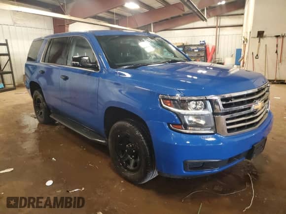 2019 Chevrolet Tahoe Commercial with VIN 1GNSKDEC0KR405293, listed as a Copart auction lot 80195935 with 131,228 mi miles and Clean title. Bid and sale history available at DreamBid. Image 4.