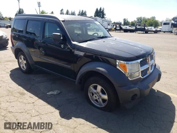 2007 Dodge Nitro SXT with VIN 1D8GT28K77W659757, listed as a Copart auction lot 63344815 with 140,843 mi miles and Salvage title. Bid and sale history available at DreamBid. Image 4.