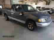 2002 Ford F-150 XL with VIN 1FTRX17292NC01028, listed as a IAAI auction lot 43277265 with Not provided miles and . Bid and sale history available at DreamBid. Image 1.