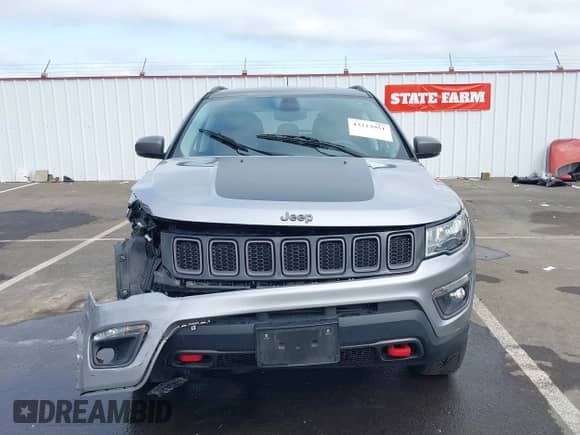 2018 Jeep Compass Trailhawk z VIN 3C4NJDDB7JT419375, wystawiony jako IAAI lot #43213951 z przebiegiem 60 692 mil mil oraz . Historia ofert i sprzedaży dostępna na DreamBid. Obrazek 12.