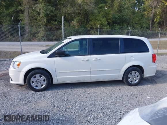 2012 Dodge Grand Caravan SE z VIN 2C4RDGBG2CR360329, wystawiony jako IAAI lot #43284519 z przebiegiem 238 300 mil mil oraz . Historia ofert i sprzedaży dostępna na DreamBid. Obrazek 14.