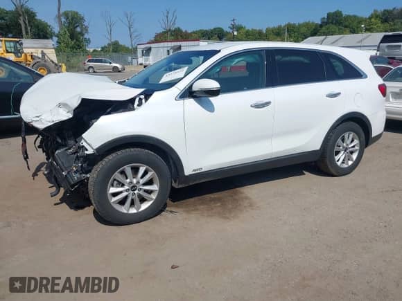 2019 Kia Sorento S with VIN 5XYPGDA5XKG446519, listed as a IAAI auction lot 43279322 with 116,678 mi miles and . Bid and sale history available at DreamBid. Image 2.