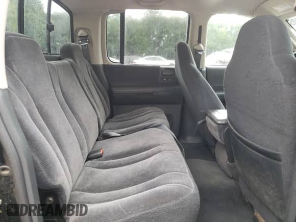 2003 Dodge Dakota Sport z VIN 1D7HL38X33S251719, wystawiony jako Copart lot #67171105 z przebiegiem 159 451 mil mil oraz Szkoda całkowita • Salvage title. Historia ofert i sprzedaży dostępna na DreamBid. Obrazek 10.