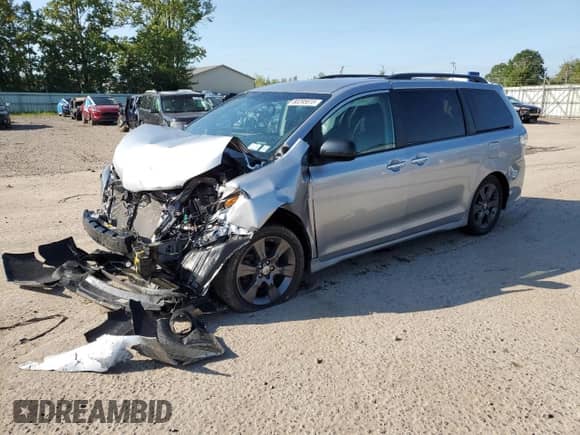 2015 Toyota Sienna SE with VIN 5TDXK3DC0FS567474, listed as a Copart auction lot 80295615 with 93,112 mi miles and Salvage title. Bid and sale history available at DreamBid. Image 1.