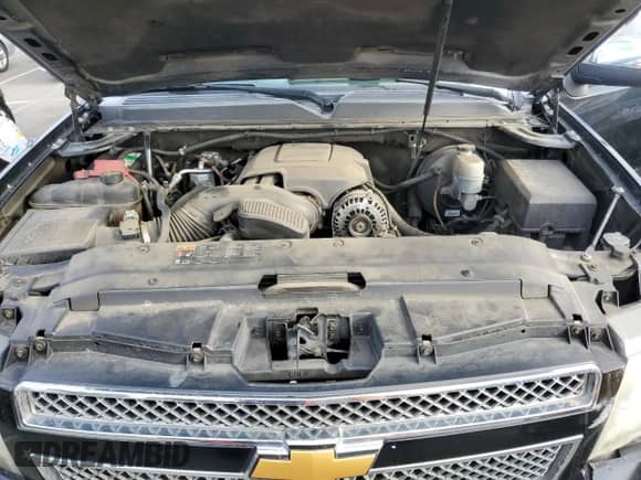 2012 Chevrolet Suburban LT с VIN 1GNSCJE03CR106674, выставлен на аукционе Copart как лот 82184705 с пробегом 227 240 миль миль и Списание • Salvage title. История ставок и продаж доступна на DreamBid. Изображение 12.