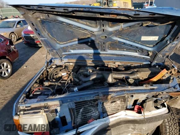 1990 Ford F-150 z VIN 1FTEF14H5LNA93728, wystawiony jako Copart lot #46463195 z przebiegiem 7 486 mil mil oraz Szkoda całkowita • Salvage title. Historia ofert i sprzedaży dostępna na DreamBid. Obrazek 11.