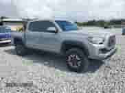 2021 Toyota Tacoma SR5 with VIN 3TMAZ5CN9MM148312, listed as a Copart auction lot 63611885 with 95,209 mi miles and Salvage title. Bid and sale history available at DreamBid. Image 4.