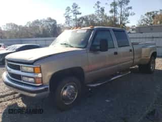 2000 Chevrolet Silverado 3500 с VIN 1GCHC33J3YF407092, выставлен на аукционе Copart как лот 82295374 с пробегом 233 363 миль миль и Списание • Salvage title. История ставок и продаж доступна на DreamBid. Изображение 1.