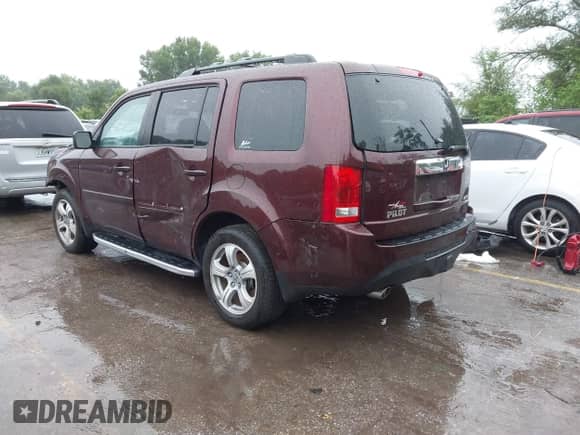 2014 Honda Pilot EX-L z VIN 5FNYF4H56EB014843, wystawiony jako IAAI lot #42965801 z przebiegiem 61 958 mil mil oraz . Historia ofert i sprzedaży dostępna na DreamBid. Obrazek 3.