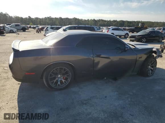 2015 Dodge Challenger SRT 392 with VIN 2C3CDZDJ4FH809650, listed as a Copart auction lot 71700425 with 111,922 mi miles and Salvage title. Bid and sale history available at DreamBid. Image 3.