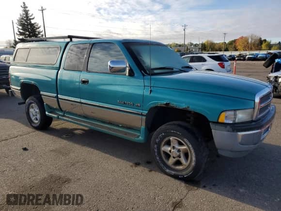 1997 Dodge 1500 with VIN 3B7HF13Y0VG734553, listed as a Copart auction lot 82716215 with 186,122 mi miles and Clean title. Bid and sale history available at DreamBid. Image 4.