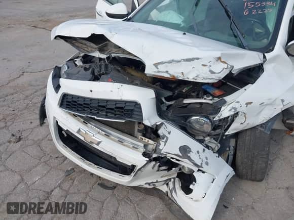 2013 Chevrolet Sonic LTZ with VIN 1G1JE6SB7D4203157, listed as a IAAI auction lot 42857551 with 110,001 mi miles and . Bid and sale history available at DreamBid. Image 6.