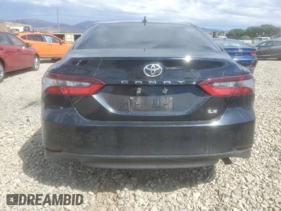 2023 Toyota Camry LE z VIN 4T1C11AK2PU156068, wystawiony jako Copart lot #81776895 z przebiegiem 28 144 mil mil oraz Szkoda całkowita • Salvage title. Historia ofert i sprzedaży dostępna na DreamBid. Obrazek 6.