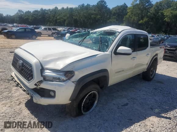 2019 Toyota Tacoma TRD Off Road z VIN 3TMCZ5AN9KM282522, wystawiony jako Copart lot #85939905 z przebiegiem 89 447 mil mil oraz Nie do naprawy • Non repairable. Historia ofert i sprzedaży dostępna na DreamBid. Obrazek 1.
