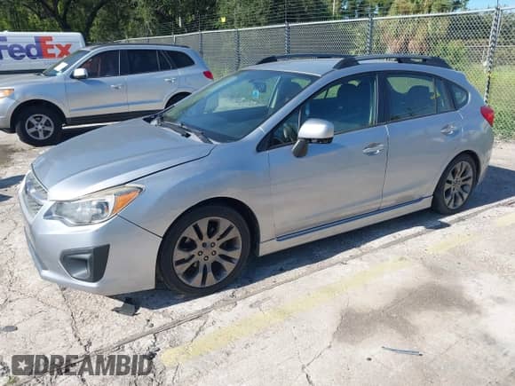 2014 Subaru Impreza Special Sports Premium with VIN JF1GPAL65E8217879, listed as a IAAI auction lot 42981633 with 142,573 mi miles and . Bid and sale history available at DreamBid. Image 2.