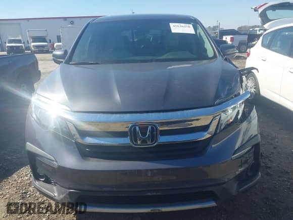 2020 Honda Pilot EX-L with VIN 5FNYF5H56LB003196, listed as a IAAI auction lot 41636258 with 76,868 mi miles and . Bid and sale history available at DreamBid. Image 13.