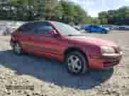 2004 Hyundai Elantra GT z VIN KMHDN56D14U109930, wystawiony jako Copart lot #65430945 z przebiegiem 74 504 mil mil oraz Szkoda całkowita • Salvage title. Historia ofert i sprzedaży dostępna na DreamBid. Obrazek 4.