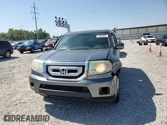 2012 Honda Pilot EX with VIN 5FNYF4H42CB015539, listed as a Copart auction lot 71696565 with 142,254 mi miles and Salvage title. Bid and sale history available at DreamBid. Image 14.