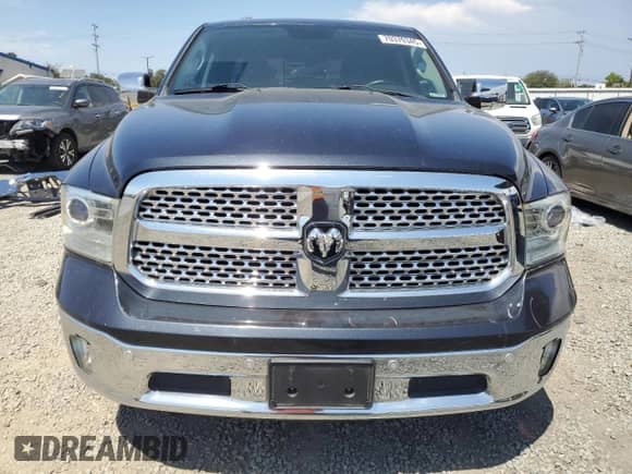 2014 Ram 1500 Laramie with VIN 1C6RR6NT1ES257108, listed as a Copart auction lot 70370345 with 104,098 mi miles and Salvage title. Bid and sale history available at DreamBid. Image 5.