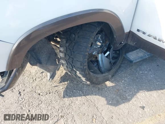 2020 Ram 1500 Longhorn with VIN 1C6SRFKT0LN127449, listed as a IAAI auction lot 42246252 with 52,034 mi miles and . Bid and sale history available at DreamBid. Image 6.