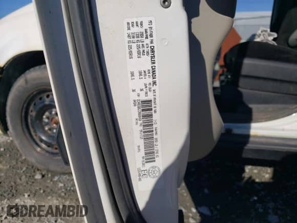 2013 Dodge Grand Caravan SE with VIN 2C4RDGBG1DR668450, listed as a Copart auction lot 84417195 with 189,536 mi miles and Salvage title. Bid and sale history available at DreamBid. Image 13.