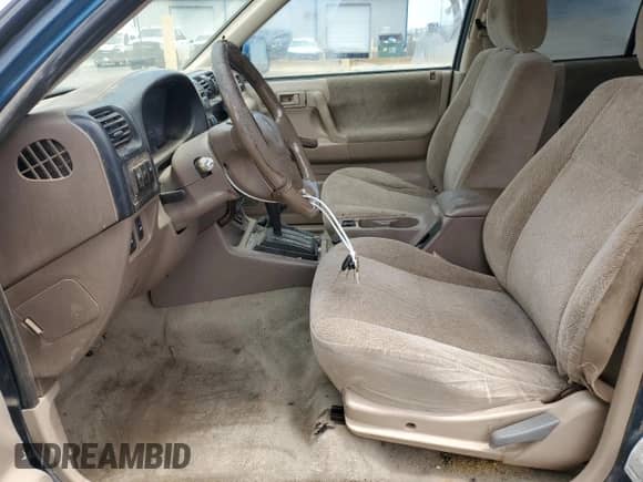 2001 Honda Passport LX with VIN 4S6DM58W014413156, listed as a Copart auction lot 61695045 with 183,594 mi miles and Salvage title. Bid and sale history available at DreamBid. Image 7.