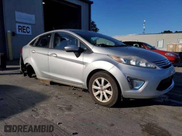 2012 Ford Fiesta SEL with VIN 3FADP4CJXCM208452, listed as a Copart auction lot 85383795 with 181,932 mi miles and Salvage title. Bid and sale history available at DreamBid. Image 4.