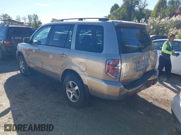 2006 Honda Pilot EX with VIN 5FNYF18476B010985, listed as a IAAI auction lot 43499562 with 228,841 mi miles and . Bid and sale history available at DreamBid. Image 3.