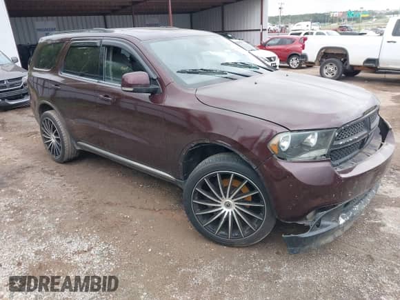 2012 Dodge Durango Crew with VIN 1C4RDHDG2CC144430, listed as a IAAI auction lot 43119474 with 252,855 mi miles and . Bid and sale history available at DreamBid. Image 1.
