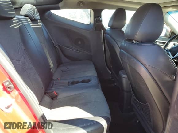 2014 Hyundai Veloster z VIN KMHTC6AD6EU192710, wystawiony jako Copart lot #72075825 z przebiegiem 119 281 mil mil oraz Czysty tytuł • Clean title. Historia ofert i sprzedaży dostępna na DreamBid. Obrazek 10.